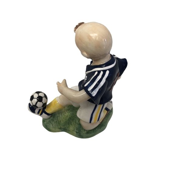 Vintage Ceramic Figurine Of Boy Playing Soccer In Navy Jersey - Picture 2 of 3